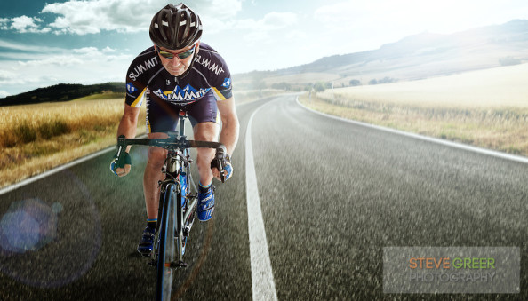 Bicycle Rider pedaling on a Country Highway