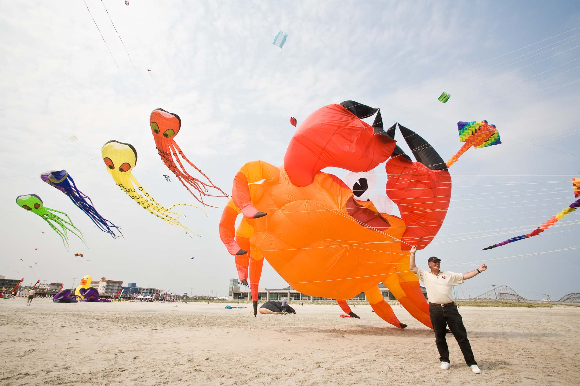 Active Senior Citizen enjoying retirement and flying kites