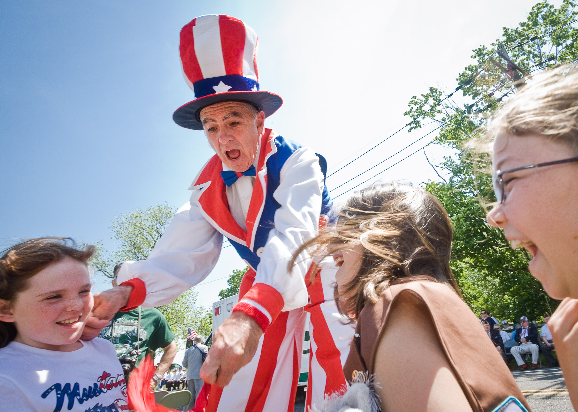 Active retired man being engaged in the community parade