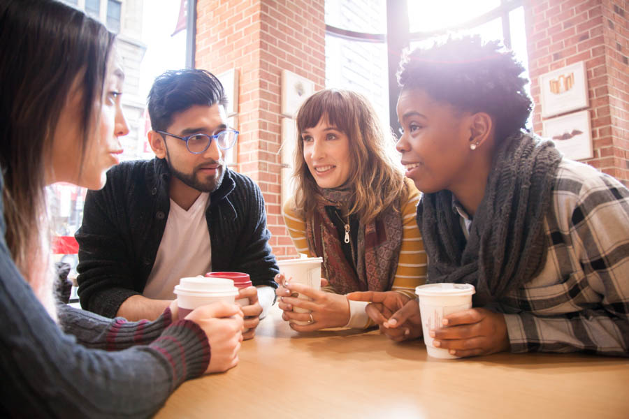 Multi-Ethnic Friends having coffee together
