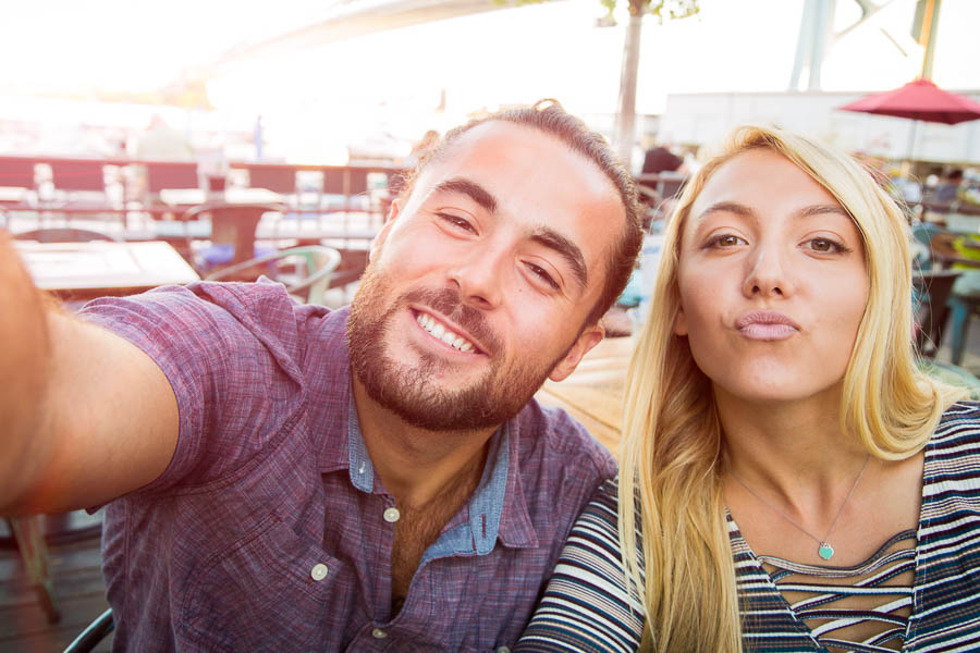 Romantic Couple Relaxing and taking Selfies with a Mobile Phone