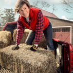 active senior farmer happy to be working outside