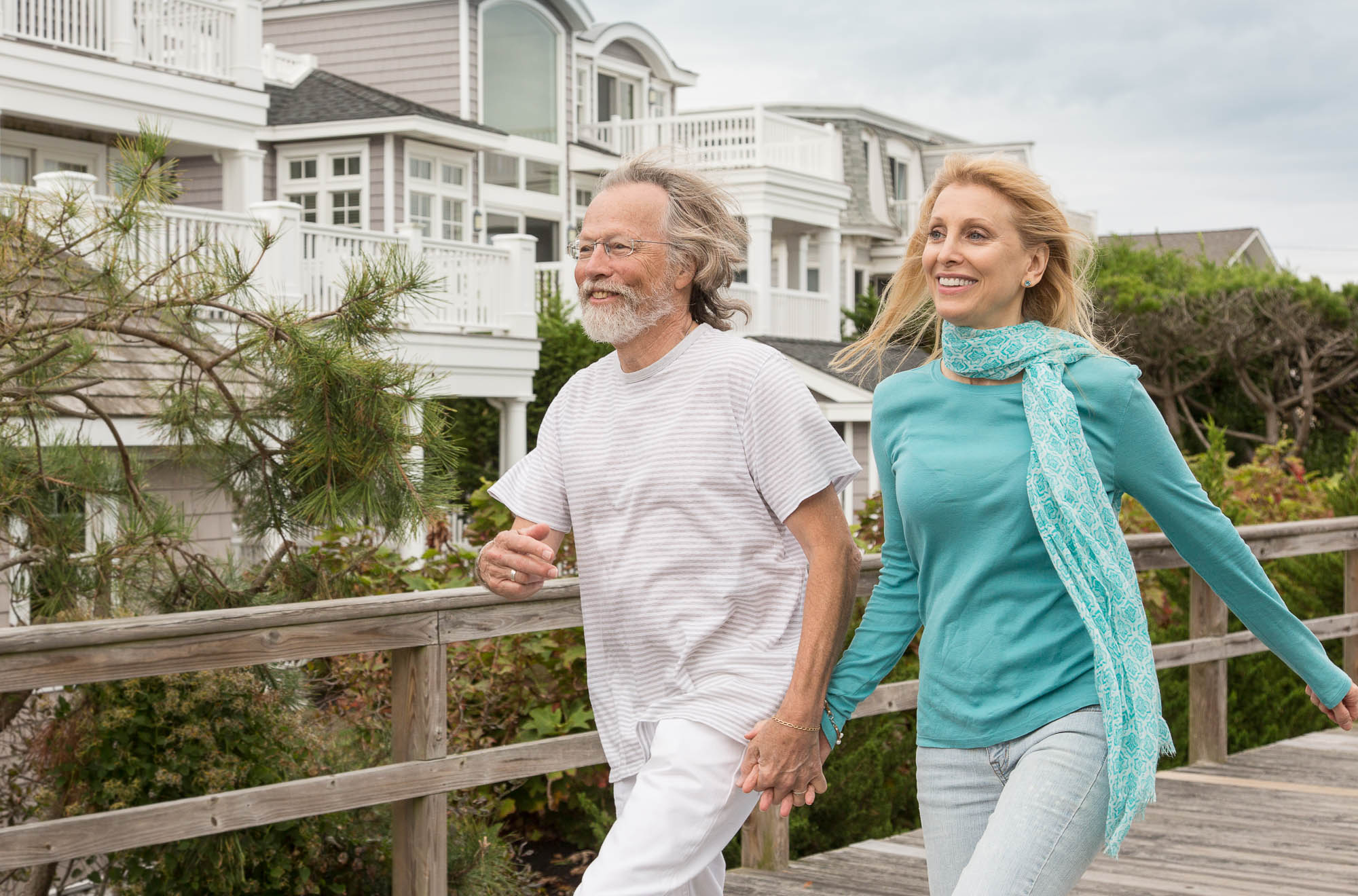 Active Senior Couple moving and staying healthy by fast walking